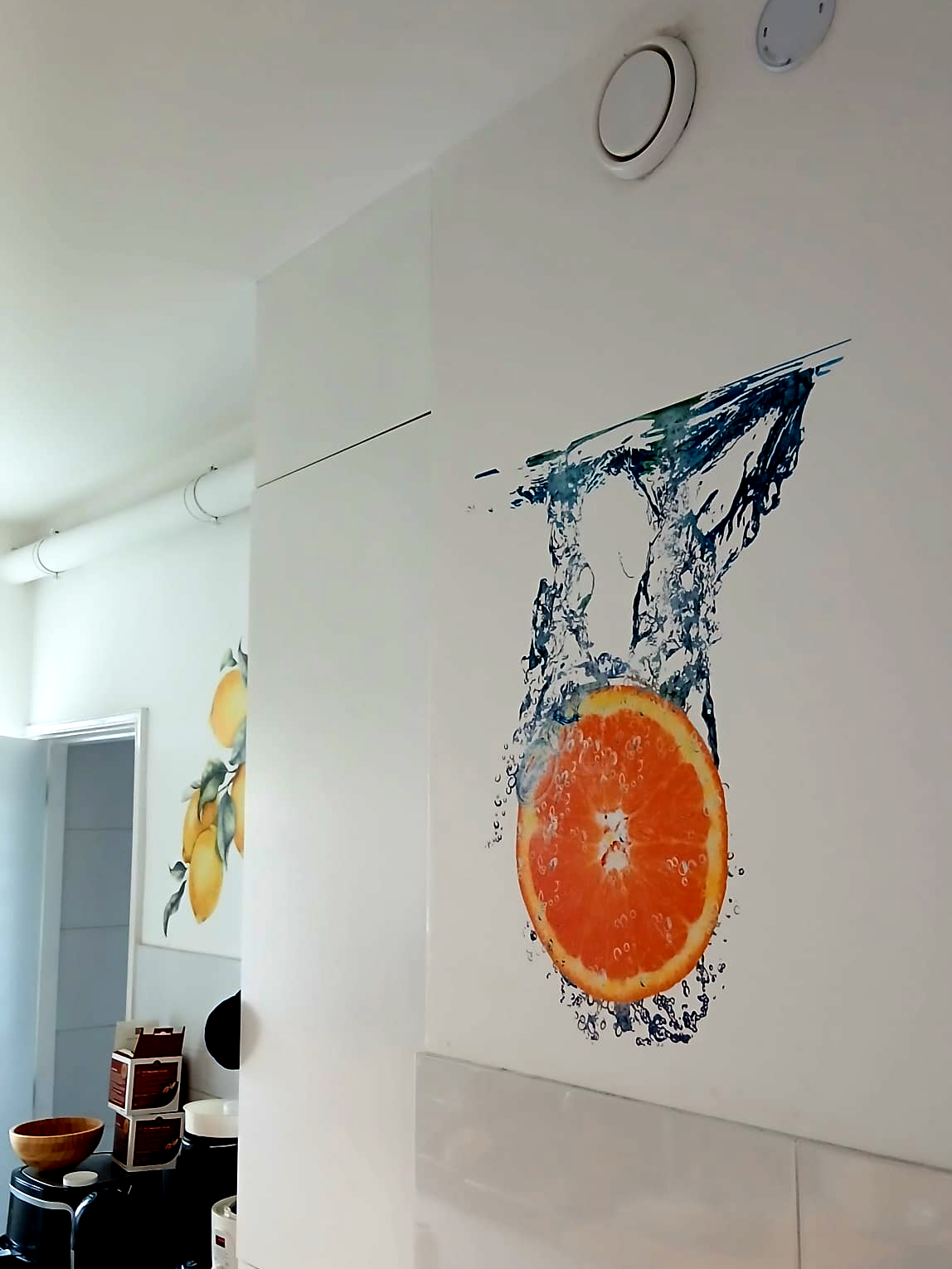 Custom wall print with fruit artwork in kitchen interior